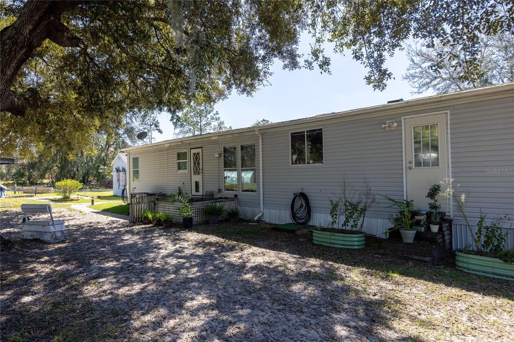 Photo of 11071 NE 78th Terrace, Bronson, FL 32621 (MLS # GC534636)