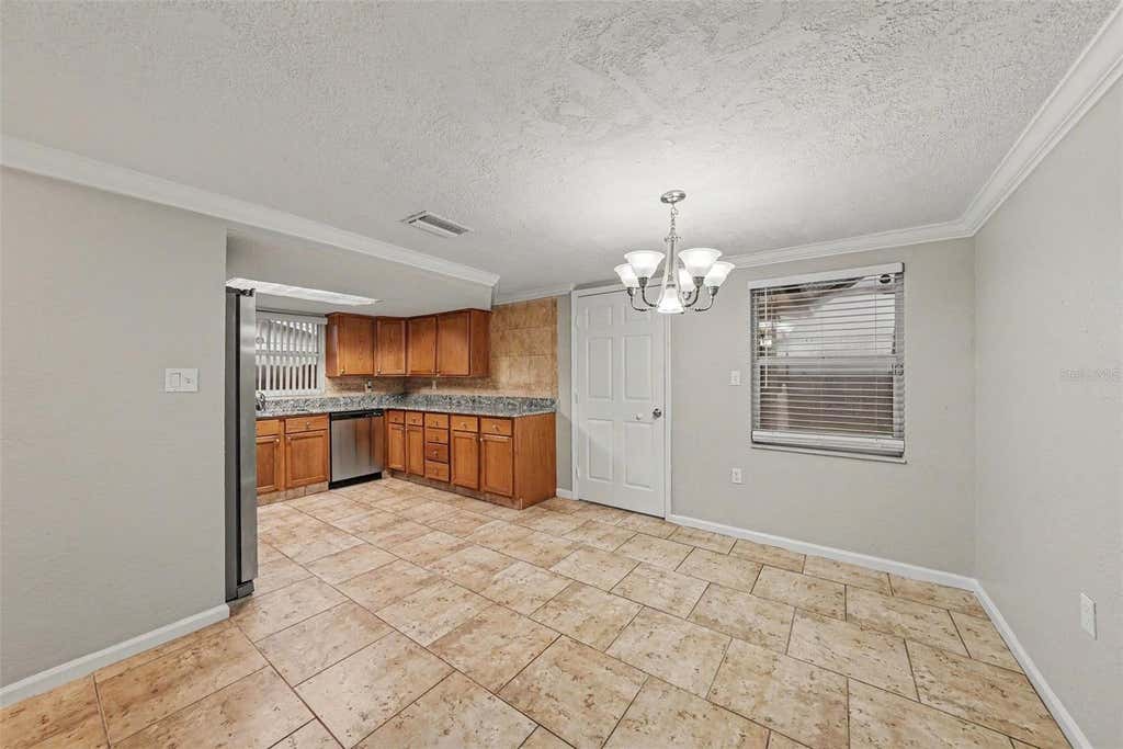 Photo of 9135 Hunt Club Lane, Port Richey, FL 34668 (MLS # O6430191)