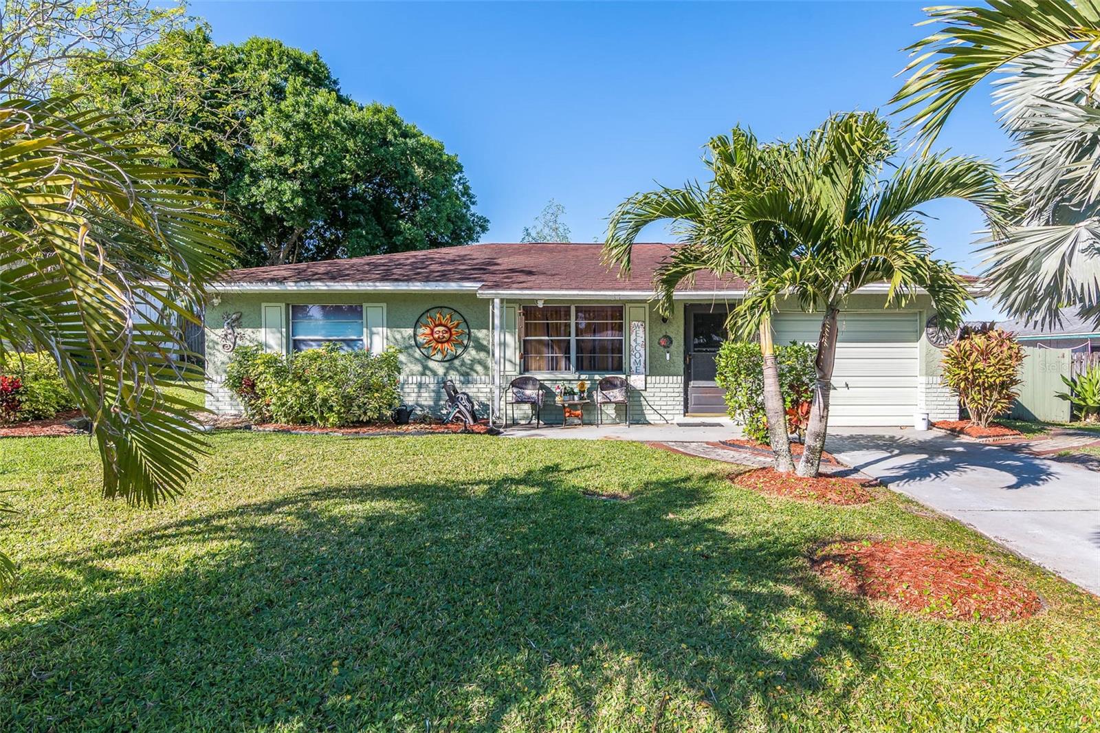 Charming Florida Cottage with Endless Potential! This 2-bedroom, 1.5-bathroom home boasts great curb appeal, lush landscaping, a 1-car garage, and a versatile den—ideal for a home office, studio, or extra living space. With a few personal touches, this home can truly shine! Key updates include a 2020 A/C and water heater. The oversized fenced backyard offers endless possibilities—plenty of space for entertaining, gardening, or even adding a fire pit to create your own private retreat. Plus, there's a shed for extra storage, perfect for tools, bikes, or garden equipment. Located just 2.4 miles from I-95, 5 miles to Merritt Island, and 11 miles to Cocoa Beach, this home offers easy access to shopping, dining, and Florida's stunning beaches. Whether you're a first-time homebuyer, investor, or looking for a peaceful retreat, this is an incredible opportunity. Don't miss out—schedule your showing today!