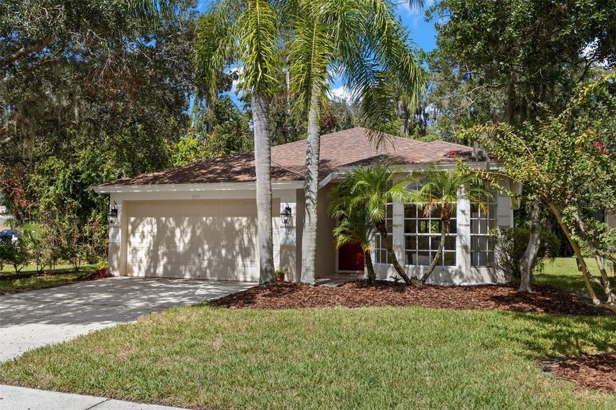 Discover the perfect blend of comfort, privacy, and resort-style living in this beautiful corner-lot home located in the desirable Kingsmill subdivision of East Lake Woodlands. With a BRAND NEW ROOF 2025, 2022 A/C system, and 2025  hot water heater, this home is move-in ready and designed for peace of mind. Step inside and be greeted by a light-filled, open floor plan that flows seamlessly from front to back. The spacious kitchen offers abundant cabinetry, a built-in pantry cabinet, and a sunny breakfast nook with large windows. The all white appliances are in great condition; A pass-through opening offers a large breakfast bar and connects to the great room, making entertaining effortless. The living and dining areas feature new laminate wood flooring and plenty of natural light, with sliding glass doors that open to a screened lanai overlooking a private conservation area—a tranquil retreat for your morning coffee or evening gatherings. Your primary suite is a true sanctuary, complete with conservation views and privacy, oversized walk-in closet with custom built-ins, dual-sink vanity with makeup desk, and large step-in shower with built-in bench and a step in whirlpool tub!!!. A bonus room with pocket doors, perfect for a home office, sitting room, or third bedroom, with its own lanai access is located immediately off the primary suite and the living room. The second bedroom is privately located toward the front of the home and offers plantation shutters and peaceful conservation views, while the full guest bath includes a step-in shower with glass doors and a linen closet. Practical touches include a two-car garage with extra cabinetry, a laundry room with washer/dryer hook-ups, utility sink and shelving, and tile flooring in the entry, kitchen, and laundry for easy maintenance. Living here means more than just making a home—it’s a lifestyle. East Lake Woodlands is a gated community known for its natural beauty, security, and abundant amenities. Residents enjoy golf courses, a tennis and pickleball complex, resort-style swimming pools and a fitness center for various memberships, walking and biking trails surrounded by lush Florida landscapes, a private clubhouse with dining and social events. Located in the heart of Oldsmar, you’re also just minutes from shopping, dining, top-rated schools, and the pristine Gulf Coast beaches. Don’t miss the opportunity to make this Kingsmill gem your new home. Schedule your private showing today and start living the East Lake Woodlands lifestyle!