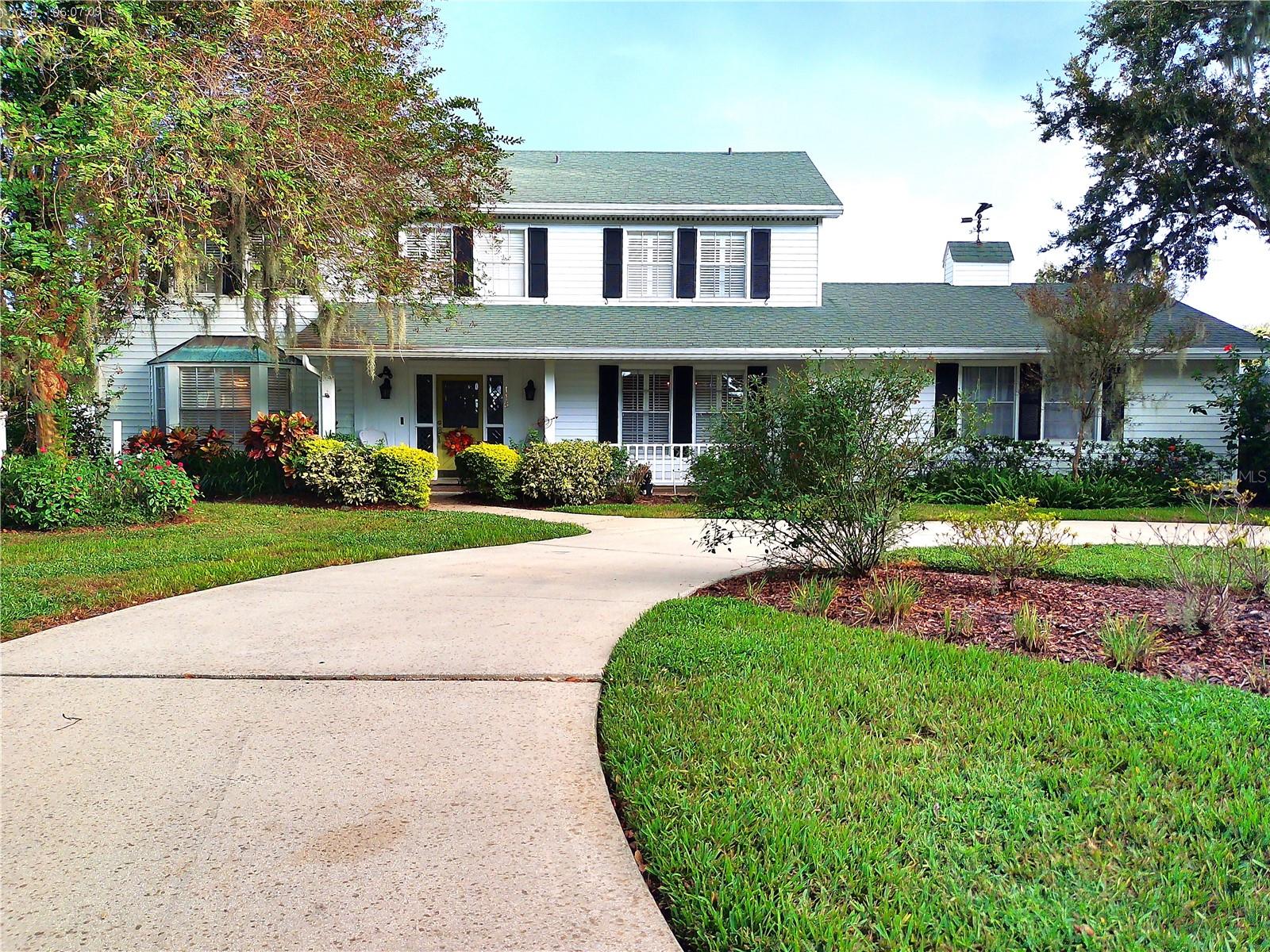 TIMELESS charm meets modern touch in this spacious pool home nestled in the heart of South Lakeland. Need to be near it all? This home is just 5-10 minutes from shopping (new Norstrom Rack-yeah!) dining, the downtown district, a brand-new hospital, Polk State Univ. and the Polk Parkway. Need room to spread out? Enjoy four ample bedrooms, two large living spaces, an entertainer's kitchen, formal dining room and a fully enclosed sunroom with a brand-new mini split system (adding additional heated/cooled square footage) for those warm summer days and the few days out of the year that it is cold in Florida. There are Plantation Shutters in almost every room and crown moulding galore. This home features one of the largest lots in this subdivision with just under 1/2 acre and the back yard is completely fenced for privacy. Enjoy outdoor BBQs under a Jasmine covered trellis and a propane fire pit for the cooler nights. Updates done prior to 2021 are master shower re-tile, gutters with leaf filters, attic insulation and AC units. Updates after 2021 are LED lighting in the kitchen, whole house re-piped, new LED light in pool, NEW SALTWATER SYSTEM and has been newly resurfaced with Quartzscapes Tropics Pebbles. Enjoy two mango trees and a Key Lime tree but the Avocado tree does not convey. The seller is also taking the flagpole and a planter hanging on the fence in the back yard. Come see your new home today-you will love the neighbors!
