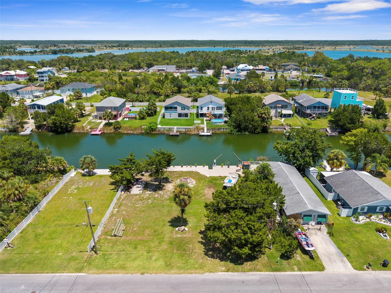 Welcome to coastal living at its finest in the heart of Hernando Beach. These waterfront lots offer 100 feet of seawall frontage, complete with davits and combines for .23 acres, perfectly positioned and ready for someone to build their dream home, vacation getaway or investment property. With NO HOA, NO CDD and NO restrictions on short-term rentals, the possibilities here are as open as the water views.
Enjoy the laid-back charm of Hernando Beach, where you will find seafood markets, waterfront restaurants and marinas, while shopping, entertainment, hospitals, and additional dining options are all within close proximity, making this an ideal location for both full-time residents and weekenders. Outdoor lovers will appreciate being just minutes to the Weeki Wachee Preserve. Only 1 hour to Tampa International Airport and 2 hours to Orlando theme parks. Don't miss this unique chance to own a true slice of Florida’s waterfront lifestyle!
Whether you're envisioning a peaceful retreat, an active waterfront lifestyle or a high performing rental, these lots are a rare opportunity to bring your vision to life in one of Florida’s most inviting Gulf Coast communities.