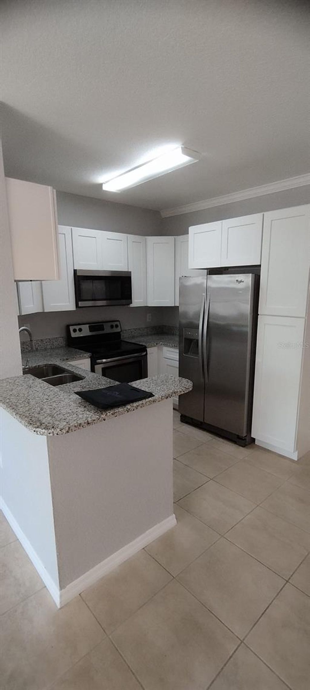 Photo of 2544 Robert Trent Drive #825, Orlando, FL 32835 (MLS # O6402796)