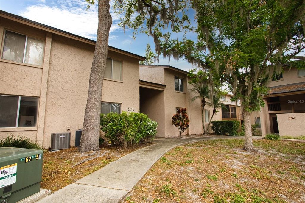 Photo of 7506 Presley Place #113, Tampa, FL 33617 (MLS # O6394184)