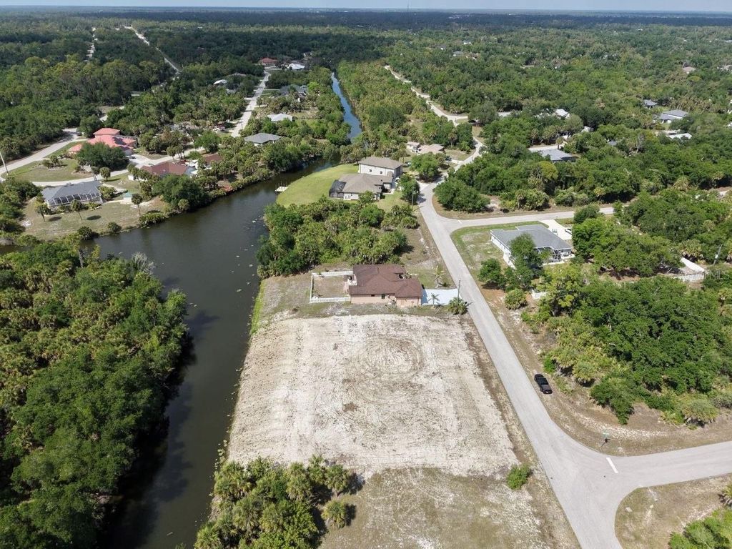 Photo of 561 Pembroke Drive, Port Charlotte, FL 33954 (MLS # C7525074)