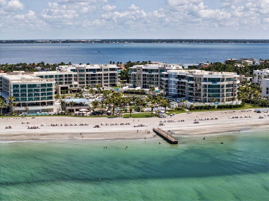 Experience spectacular Gulf of Mexico vistas from this direct west-facing and exceptionally private residence at The St. Regis Longboat Key. Floor-to-ceiling windows bathe the interiors in natural light and frame unobstructed water views, while the expansive living room provides the perfect setting for elegant entertaining. Step onto the sweeping 878-square-foot terrace—complete with a Wolf gas grill—and enjoy front-row seats to Longboat Key’s world-famous sunsets. The chef’s kitchen is a masterwork of form and function, featuring Poggenpohl cabinetry, Sub-Zero refrigeration, Wolf appliances including double ovens and a gas cooktop, microwave, dishwasher, and a wine/beverage refrigerator. The owner’s suite is a serene retreat with an entire wall of glass overlooking the Gulf and resort grounds. A custom Closet Envy wardrobe ensures abundant storage, while the spa-like bath offers dual vanities, a soaking tub, walk-in shower, and Toto electric commode. The generous ensuite guest bedroom also enjoys Gulf views, custom built-ins, and direct access to the terrace. Finishes throughout, curated by Marc-Michaels Interior Design, embody timeless sophistication. Beyond the residence, The St. Regis Longboat Key offers a collection of world-class amenities designed exclusively for its residents. The private clubhouse features a state-of-the-art fitness center and a resident-only pool and spa. Signature St. Regis Butler and Concierge services set a new standard for luxury living. Indulge in the oceanfront spa, diverse dining venues, and beachfront cabanas, or enjoy family-friendly amenities including a lazy river and a saltwater lagoon teeming with tropical fish, stingrays, and the resort’s resident tortoises. Set on 17 acres of pristine beachfront, and just 3.5 miles from St. Armands Circle’s renowned shopping and dining, this residence represents more than a home—it’s an invitation to embrace the legendary St. Regis lifestyle, where elegance, comfort, and unparalleled service define every moment. Begin your journey to Live Exquisite at The St. Regis Longboat Key