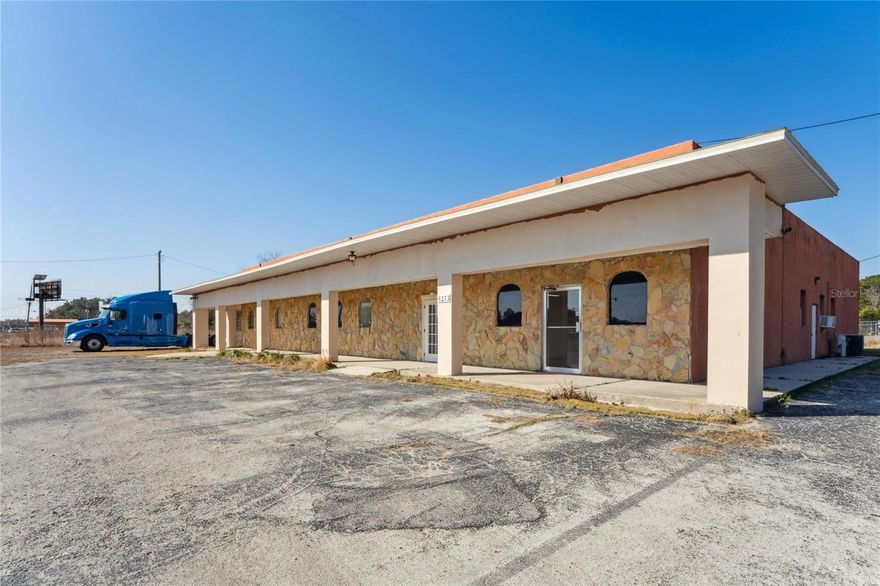 High visibility! Located on the intersection of  Highway 301 & Highway 50. Approximately 25,000 cars pass by per day! In the heart of the fastest growing section in Hernando County. This property offers great potential for any type of business. Owner financing available with great terms.BRING ALL OFFERS