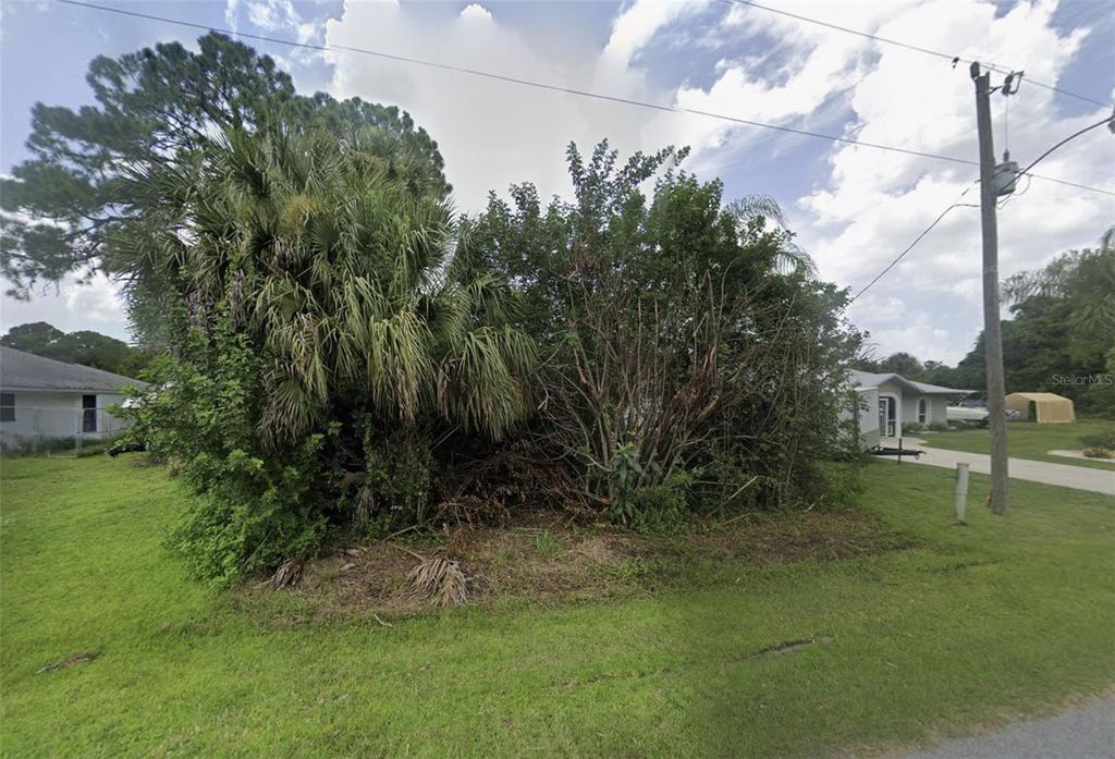 Photo of 79 Ramblewood Street, Port Charlotte, FL 33953 (MLS # O6361263)