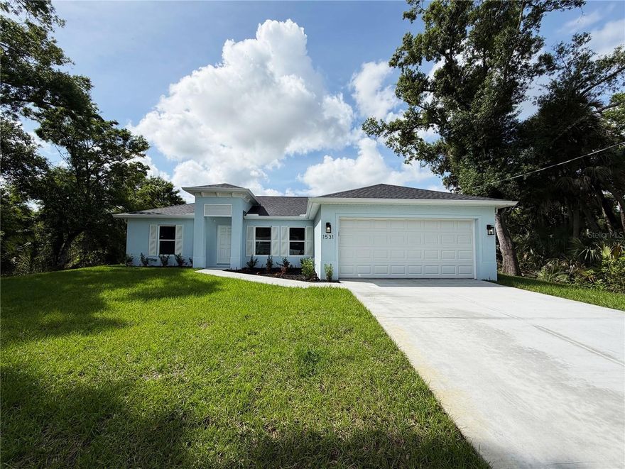 One or more photo(s) has been virtually staged. Beautiful New Construction Home Available Now on a Greenbelt! Everything is Included and Everything is Upgraded! Starting with an open, split floor plan with vaulted ceilings, this home has Hurricane Impact, insulated, low e windows, full overlay cabinets, stainless steel kitchen appliances, quality stone countertops and window sills, porcelain tile throughout, 30-year shingles, 3 zone sprinkler system, screened lanai, brand name plumbing and electrical fixtures, fully sodded and landscaped. This home has been built to keep insurance, maintenance and utility costs low. Preferred lender is offering up to $1,500 in closing cost assistance!  Take a tour through one of our Beautiful Homes: https://youtu.be/SFsL-Aell24