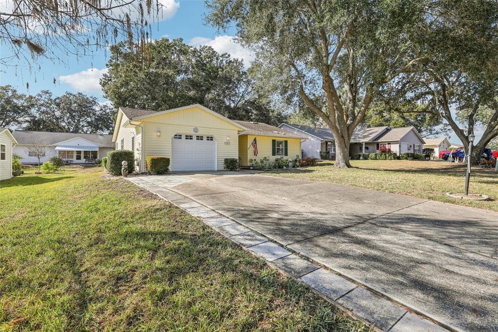 Photo of 1507 New Abbey Avenue, Leesburg, FL 34788 (MLS # OM716235)