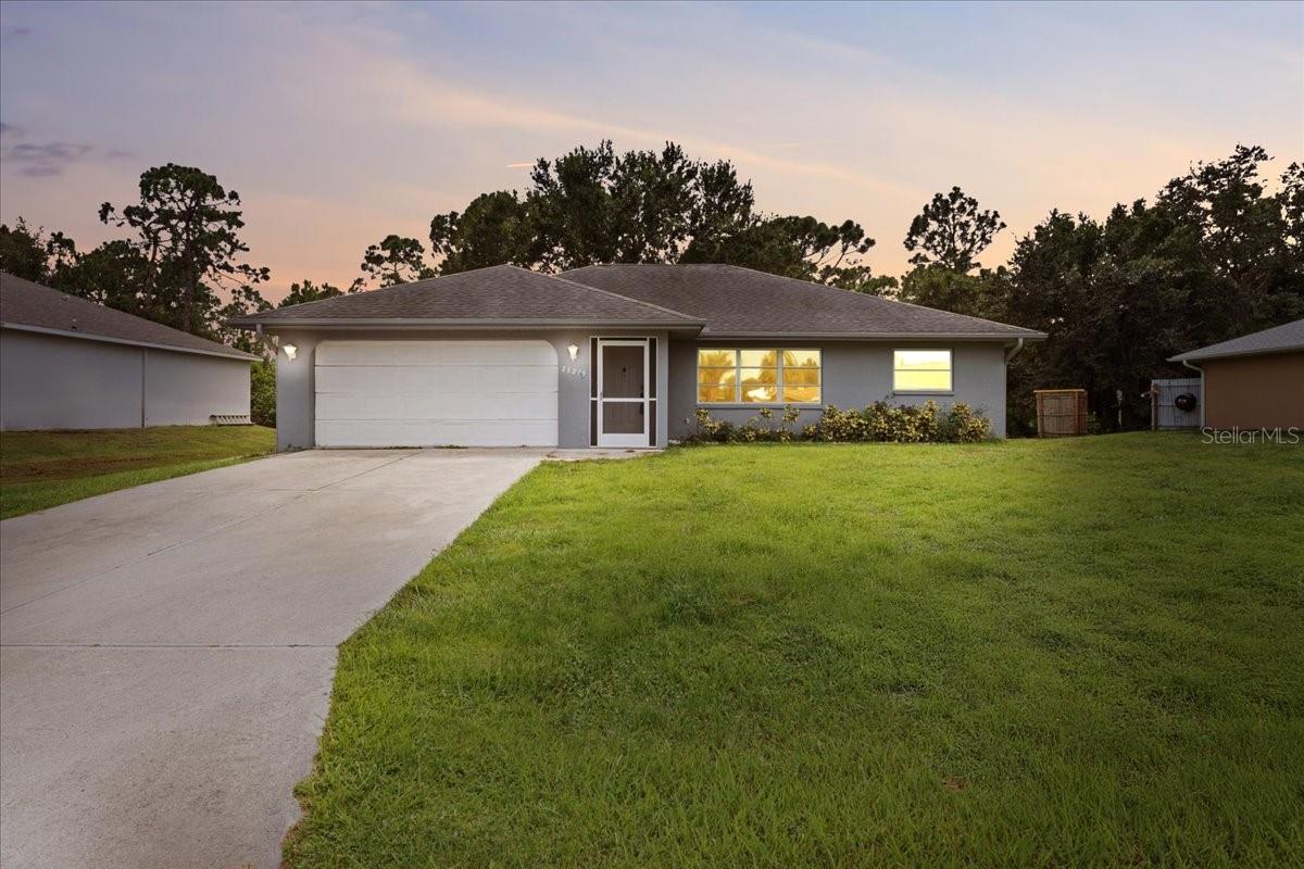 Under contract-accepting backup offers. Well-maintained home in a convenient Port Charlotte location. This property features a split floor plan, new LVT flooring throughout, and has been fully re-piped. The oversized garage offers plenty of storage or workspace, and the 300 sq ft screened lanai provides a great spot to relax or entertain. Located close to Gulf beaches, shopping, dining, medical facilities, boating, fishing, tennis courts, and parks. Move-in ready and ideally situated for enjoying all that the area has to offer.