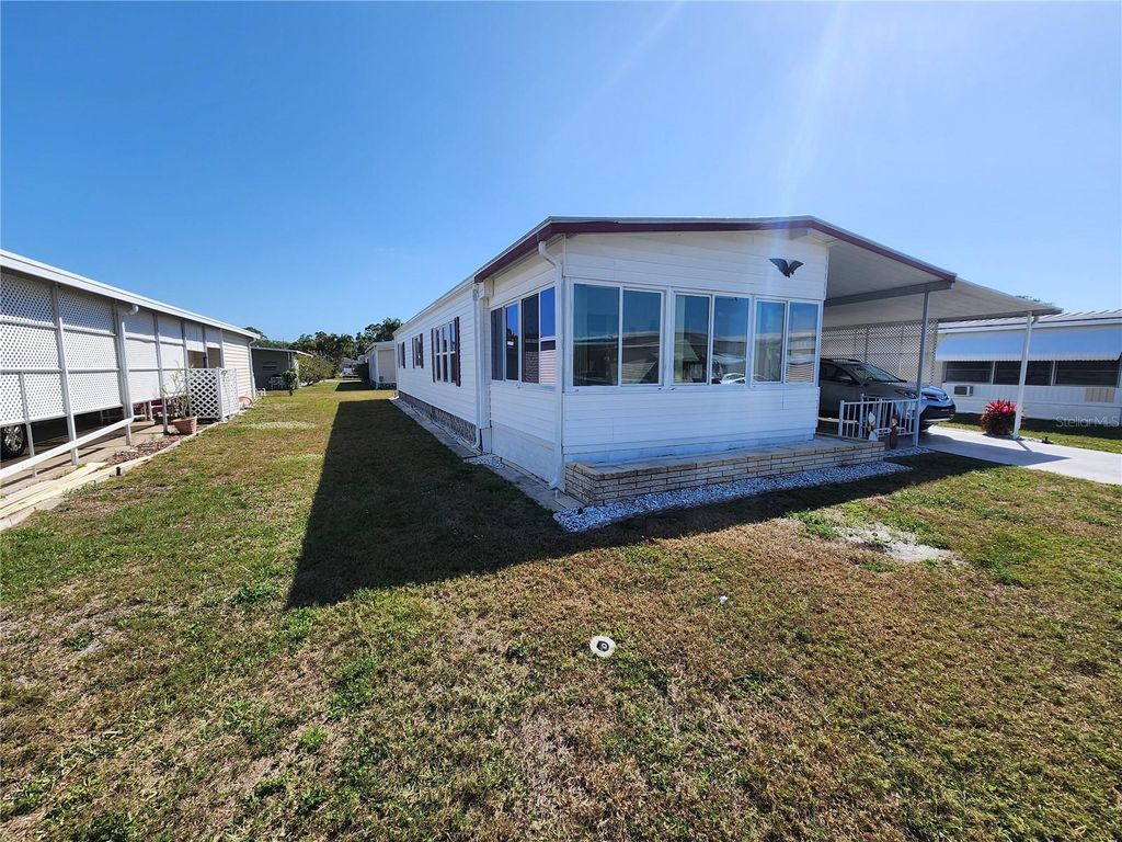 Photo of 808 53rd Avenue E #234, Bradenton, FL 34203 (MLS # A4647381)