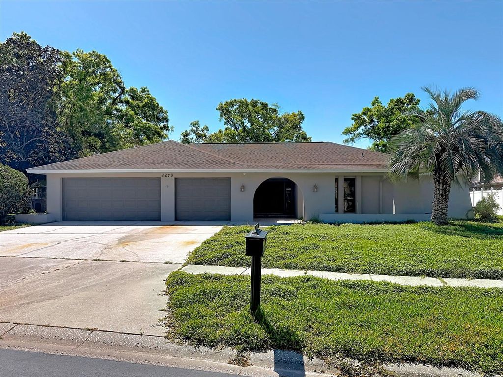 Photo of 4072 Belmoor Drive, Palm Harbor, FL 34685 (MLS # TB8489064)