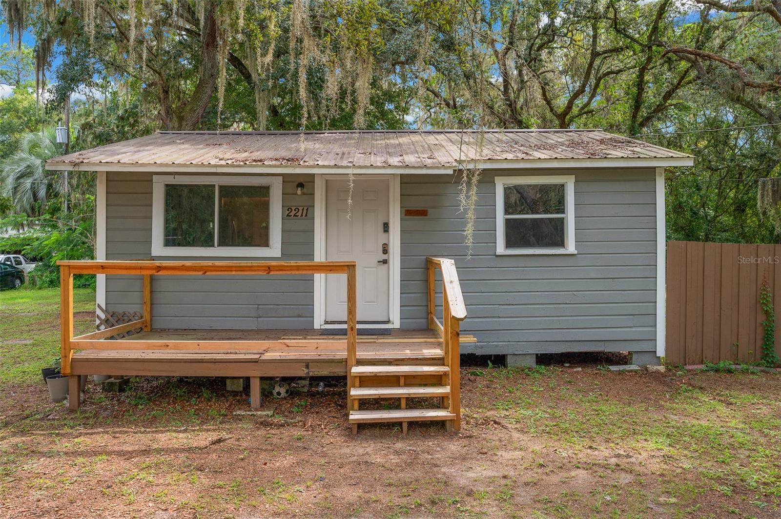 Discover a cozy and inviting 2-bedroom, 1-bath home just under 5 miles from downtown Gainesville. With its charming front porch and shaded lot, this property offers both comfort and convenience in a peaceful setting.
Inside, you’ll find a practical layout that maximizes space, featuring a bright living area, efficient kitchen, and two well-sized bedrooms. The crawlspace foundation adds easy access for maintenance, while the wood-siding exterior provides classic appeal.
This home is an excellent option for anyone seeking an affordable place close to Gainesville’s restaurants, shopping, and cultural activities. Whether you’re looking for your first home, a downsizing option, or an income-producing rental close to the city center, this one checks the boxes.
Enjoy the balance of privacy, convenience, and value—ready for you to make it your own.