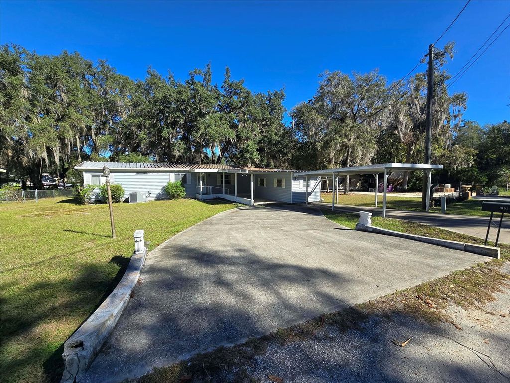 Photo of 1991 SE 170th Avenue Road, Silver Springs, FL 34488 (MLS # R4910250)