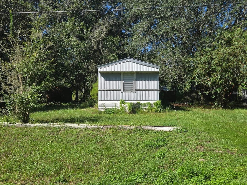 Photo of 251 Tarpon Boulevard, Palatka, FL 32177 (MLS # GC544069)