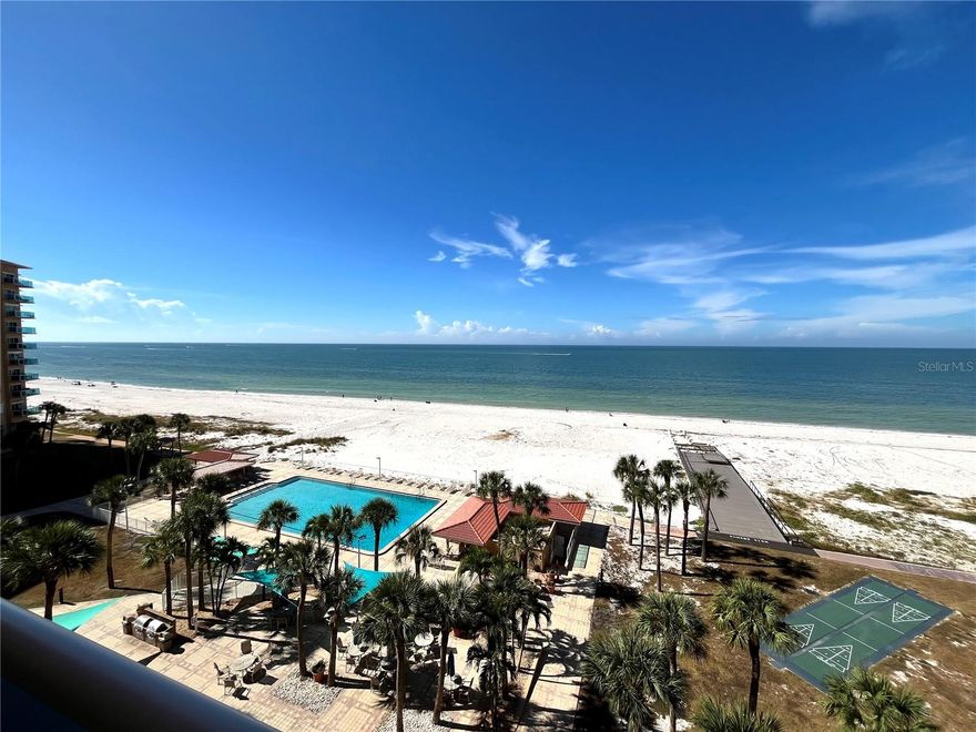 STUNNING BEACH & GULF VIEWS from this one bedroom/one bath front beach condo in the sought after GATED REGATTA BEACH CLUB. FABULOUS LOCATION! BEACHFRONT BUILDING on NORTH CLEARWATER BEACH. As you enter the condo, you will be amazed by the incredible open views of the sugary sand beach, Gulf and pool area. This condo is being sold TURNKEY and FULLY FURNISHED for your convenience. The large living area is ideal for entertaining, featuring ample living and dining space with plenty of natural light, opening through its sliding glass doors to a large open-air balcony where you will enjoy incredible views of the sparkling Gulf waters and the most beautiful sunsets! This condo is one of the exceptionally rare units that has dual entrances to the large panoramic balcony, with convenient access from both the living room and the large bedroom offering a seamless indoor-outdoor living space. The condo has beautiful travertine floors though-out. The kitchen has beautiful cabinetry and granite countertops. The kitchen opens into the living room though its breakfast bar featuring gorgeous white quartz counter and offering direct beach view. The spacious bedroom has 2 closets offering plenty of storage, a lot of natural light with beach views with direct access to the large outside balcony. The bathroom has nice granite countertops, and a large shower. 

This unit comes with the use of assigned covered carport #17.  

The highly desirable North Beach location of this community provides the ultimate vacation experience, as a weekend getaway or second home. or as your permanent vacation residence. You will enjoy the pristine sugar sand of this quiet North Beach location far from the busy tourist beach. Or you can choose to relax around the beautiful pool area. You can also take a lovely walk north towards Caladesi State Park, or south towards Pier 60 and all the wonderful Clearwater Beach restaurants and attractions. Clearwater Beach has been voted many times #1 beach in the country. The community offers an Olympic size heated pool directly on the Gulf side, pool deck with barbecue areas, complete fitness center, social room, game room with table tennis and pool table, a spacious Community room with kitchen, a 13 seat Movie theater, Bicycle & Kayak Storage room, Workshop, EV Charging stations and Car wash facilities. The community grounds are always kept immaculate with daily maintenance, 24hr security and plenty of parking. The beach trolley stops in front of the property and is a great way to enjoy all Clearwater Beach has to offer: restaurants, nightlife, shopping, charter boat fishing, dinner cruises, sightseeing tours, dolphin spotting tours, pirate ship, daily sunsets at pier 60 with artisans, crafters, as well as musical entertainment. Live the Resort lifestyle of this unique beachfront retreat nestled along the pristine shores of Clearwater beach. You will always feel like you are on vacation in this remote paradise! 

And when you aren’t soaking up the sun at your new beach condo, you can earn extra income with your investment by renting it out for others to enjoy! (90-day min lease period, always in high demand for seasonal rent)
