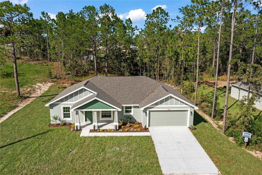 Photo of 12483 Downy Woodpecker Road, Weeki Wachee, FL 34614 (MLS # TB8559645)
