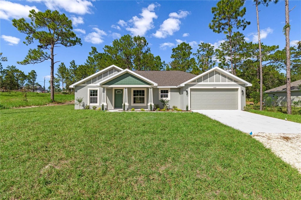 Photo of 12483 Downy Woodpecker Road, Weeki Wachee, FL 34614 (MLS # TB8559645)