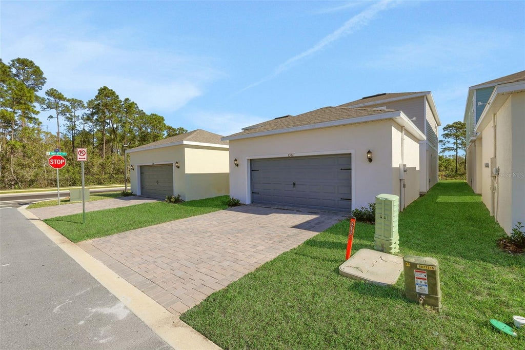 Photo of 13011 Tranquil Water Alley, Winter Garden, FL 34787 (MLS # O6414240)