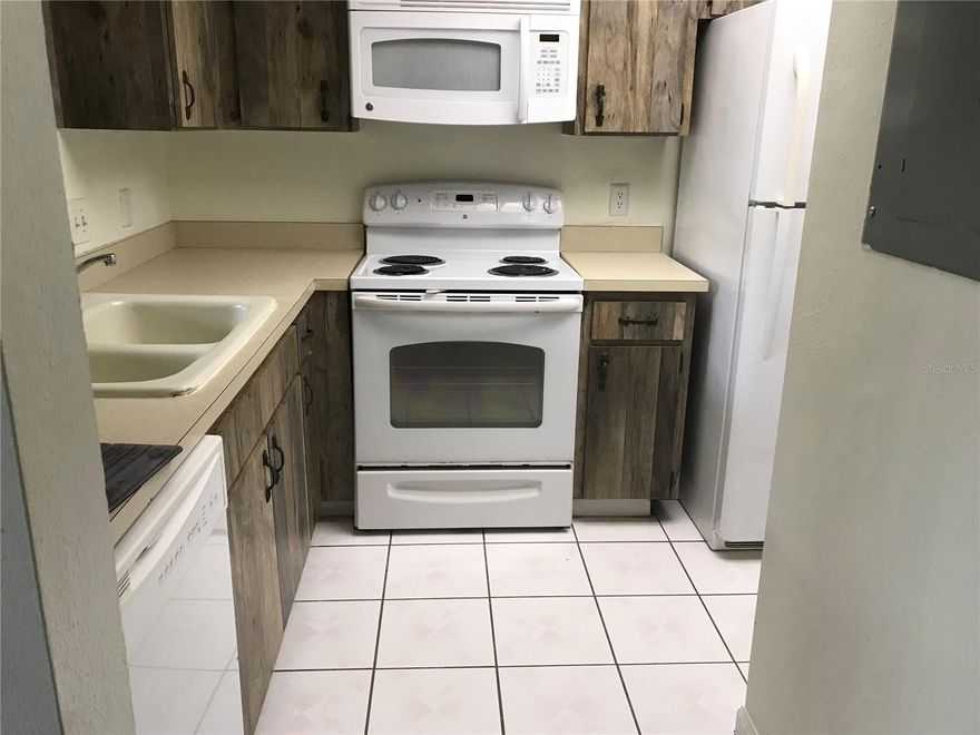 Welcome to easy living in the heart of Carrollwood Village! This charming one-bedroom condo at Village Towers offers comfort, convenience, and a peaceful community lifestyle. Enjoy access to resort-style amenities including a sparkling community pool and tennis courts, perfect for relaxing or staying active year-round. Surrounded by beautiful parks, walking trails, and green spaces, this location is ideal for anyone who loves the outdoors while still being close to shopping, dining, and entertainment. Whether you’re looking for a primary residence, seasonal getaway, or investment opportunity, this condo is a fantastic place to call home.