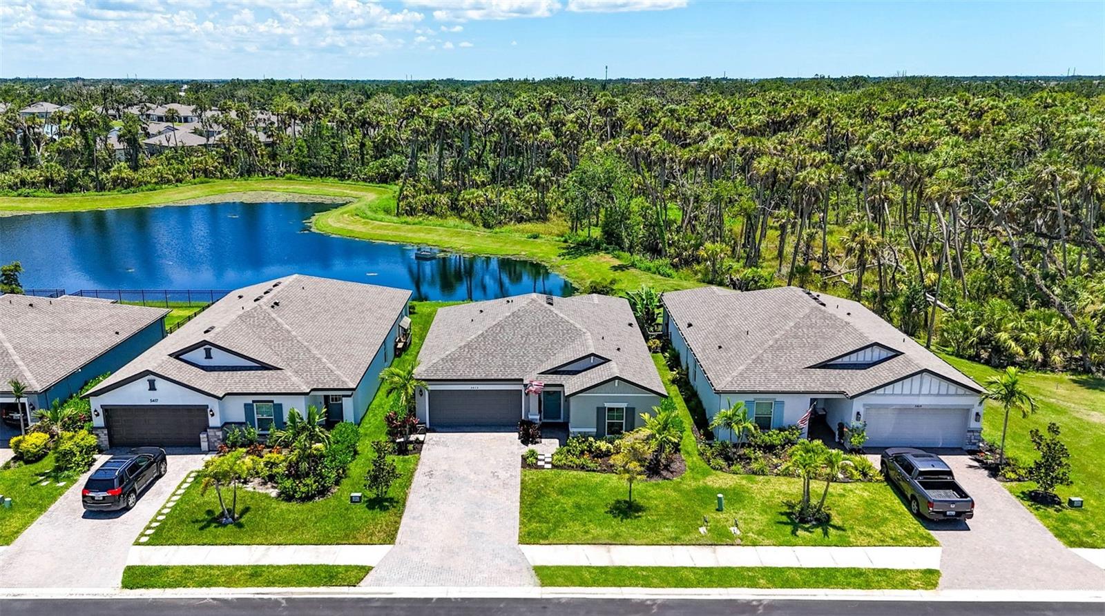 Don’t be fooled by other lower-priced rentals! This home INCLUDES PREMIUM EXTRAS at no additional cost! Located in the highly desirable Gated Community of Trevesta. Rent includes LOTS of extras like: Cable TV, High-speed Internet, Lawn Irrigation, Pond Maintenance, and access to all of Trevesta’s Resort-style Community Amenities - Zero-entry resort-style POOL with Splash Pad, 24-hour Fitness Center, Clubhouse with event space, Playground, year-round community Events, Food Truck nights, and Golf-cart Friendly roads. Positioned on a scenic natural pond with no rear neighbors, enjoy daily wildlife views and tranquil waterfront living. Even catch-and-release FISHING is allowed for residents! Interior features include an open, split-bedroom layout, wood-look ceramic tile flooring in main living areas and bathrooms, upgraded ceiling fans, stylish lighting, Washer/Dryer, SMART HOME FEATURES, and brand-new Dishwasher all included. The spacious living area opens to a covered lanai with peaceful pond views—ideal for relaxing or entertaining. Retail shopping and dining begin just outside the gate. Conveniently located in Flood Zone X (no flood insurance required) and a non-evacuation zone with easy access to I-75 and minutes to many Tampa Bay attractions. Lease Term: 12 months. Immediate occupancy available & Pet Friendly.