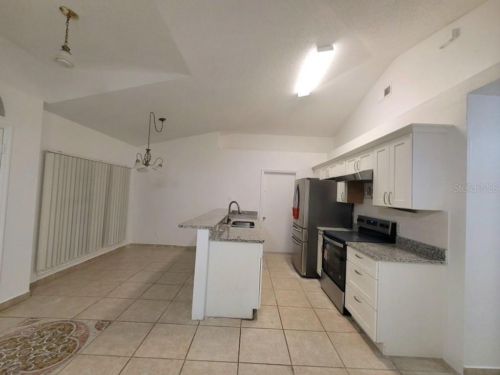Photo of 7550 Pine Fork Drive, Orlando, FL 32822 (MLS # S5135900)