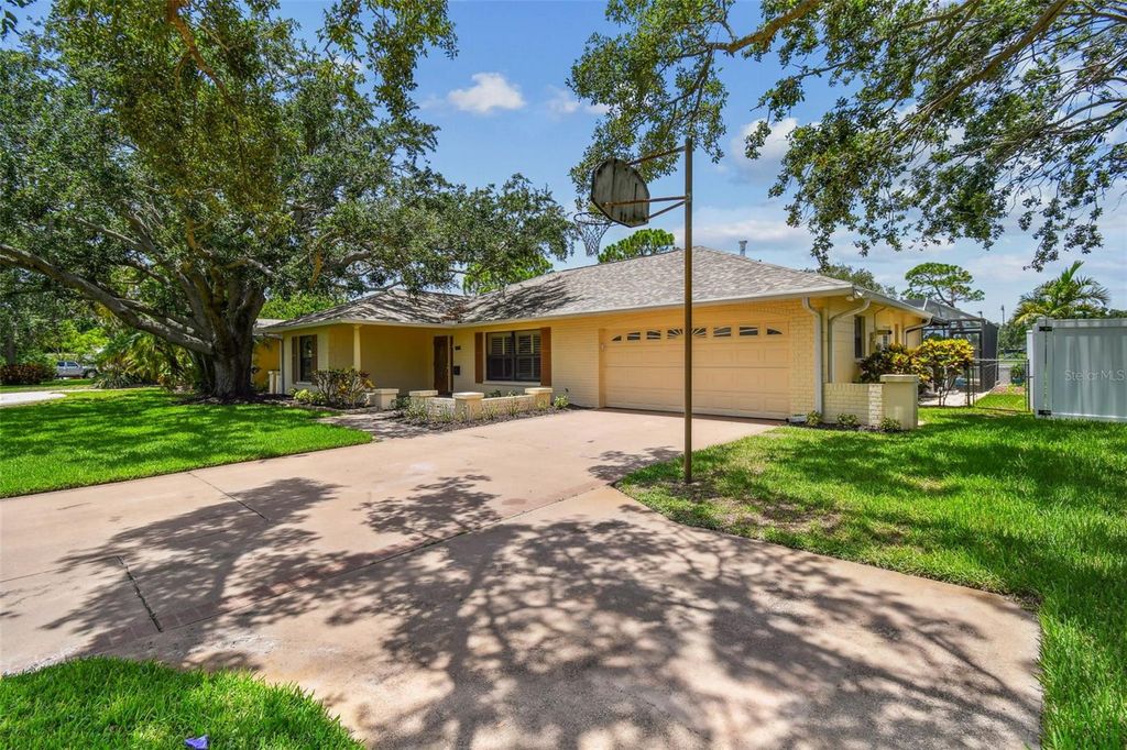 Photo of 1443 54th Avenue NE, St Petersburg, FL 33703 (MLS # TB8394885)