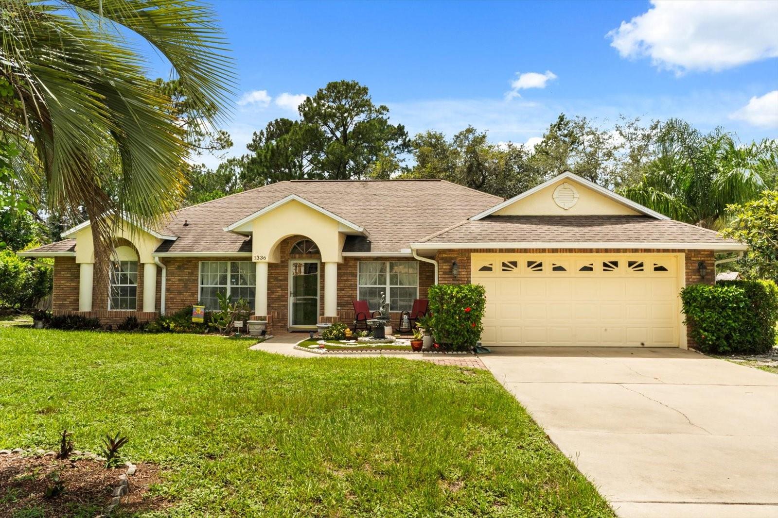 Welcome to this beautifully updated 4-bedroom, 2-bathroom single-family home centrally located between Orlando and the beaches. Built in 1994 and thoughtfully remodeled recently, this 2,216-square-foot home offers modern amenities and timeless charm. As you step inside, you'll be greeted by elegant tile flooring in the main walkways and beautiful wood floors in the living, dining, and family rooms. Neutral paint tones create a warm and inviting atmosphere. The open-concept family and kitchen area features a vaulted ceiling and sliding glass doors that lead to the lovely three-season patio and tranquil CONSERVATION views of the backyard, perfect for entertaining, relaxing, or birdwatching. The gourmet kitchen is a chef's dream, boasting ample cabinetry with large drawers, stunning granite countertops, a huge island with counter seating, under-cabinet lighting, and more! The generously sized bedrooms provide plenty of closet space, while the primary suite offers a luxurious retreat with a huge walk-in closet equipped with an organizational system. The en suite bathroom was updated in 2024 and features a spa-like shower, a soaking tub, and double sinks, providing a tranquil space to unwind. Additional highlights include hallway storage closets, an interior laundry room with extra space, and a two-car garage offering even more storage solutions. Situated on an oversized lot with NO HOA, this home provides a peaceful setting while remaining just minutes to I-4, Halifax Health, and equidistant to Orlando and the Volusia beaches. Don't miss the opportunity to make this home your own. Contact me today for a private showing.