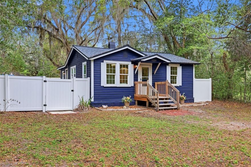 For the buyer who loves a cute cottage and wants to live in a home with soul — this a place that feels warm, personal, and just a little set apart. This 3 bedroom, 2 bath home was beautifully remodeled in 2025 and offers exactly that. Set in a centrally located, popular NW Gainesville neighborhood, this home blends the character of an older home with the comfort of extensive modern updates. Inside, the original pine tongue-and-groove floors have been refurbished, adding warmth and charm to the living spaces. Natural light pours into the home and thoughtful finishes create a home that feels both fresh and grounded. The layout is impressively efficient, don’t let the square footage fool you. All three bedrooms are large enough to fit a queen bed, nightstand, and dresser. You could certainly use all three bedrooms as bedrooms, but you also would have the flexibility to create a reading room, office,  game room, or creative space that fits your life in one of them. The kitchen has been fully remodeled with high-quality soft-close custom cabinetry (no big box store cabinets here), quartz countertops, new tile floors, Samsung appliances, and a chef’s sink with built-in accessories that make everyday living easier and more enjoyable. Both bathrooms have also been fully renovated with stylish, easy-care finishes, with one offering a walk-in shower and the other a tub. Just as important, the major system updates have already been taken care of. With updated electrical wiring, repiped with both the water supply lines and the sewer lines, a new HVAC system with all new ductwork, a new gas line brought to the property, a gas tankless water heater, added wall insulation, and fresh interior and exterior paint all done in 2025. The LG Ultra-large capacity, SMART, space-saving laundry center is included and makes doing laundry a breeze. This is a home where you can settle in and focus more on living since the renovations were so extensive. Outside, the newer 6-foot vinyl fence creates the kind of privacy that feels increasingly rare. The backyard offers space to unwind, garden, let pets roam, host a few friends, or simply enjoy a quiet evening at home. It feels private, peaceful, and comfortably your own. With no HOA and no extra monthly fees, this home offers charm, functionality and independence. Less than 4 miles to UF Health/Shands Hospital, 4 miles to the VA Medical facilities, just 3 miles to University of Florida, 6 miles to Santa Fe College. Shopping is great too! Just one mile to either Publix or Aldi, just 1 mile to Hibbett Sports, Ross, Burlington Coat Factory, Lowe’s and more. This is the kind of home that feels different in the best way — updated, inviting, and full of character and ready for you to just bring your belongings and start living!