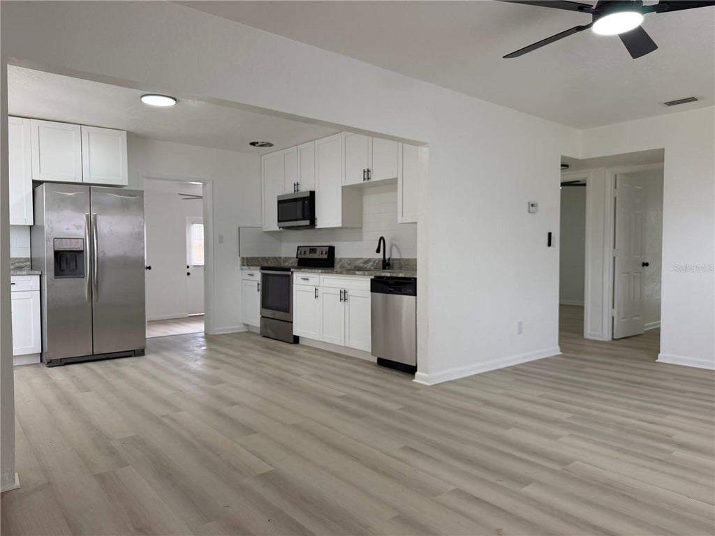 Photo of 10909 N 14th Street, Tampa, FL 33612 (MLS # TB8534865)