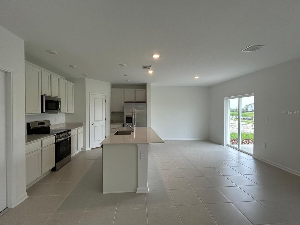 Photo of 5680 Portico Place, Kissimmee, FL 34758 (MLS # O6319940)