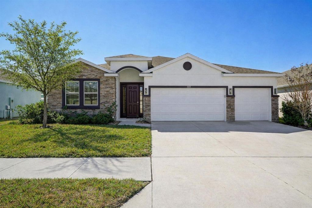 Photo of 3458 Autumn Amber Dr, Spring Hill, FL 34609 (MLS # TB8479489)