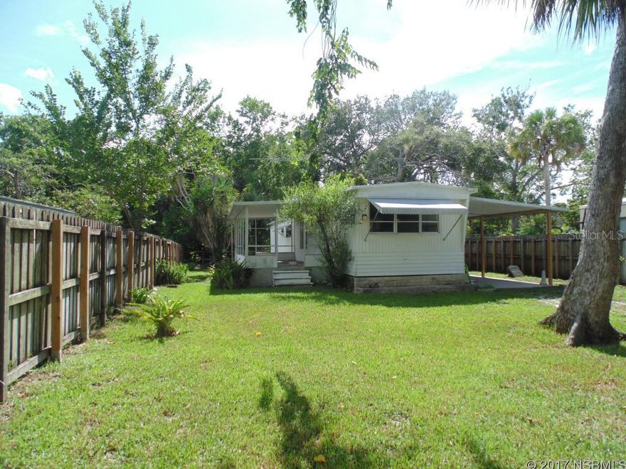 Single wide mobile home on beautiful 50x150 lot.  This home just needs your TLC and it will be transformed into a perfect home or vacation getaway.  Large carport and side porch, and extra storage off of home. ;Water: City