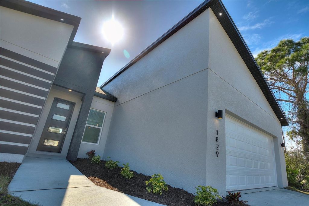 Photo of 1829 Northland Avenue, North Port, FL 34288 (MLS # O6398272)