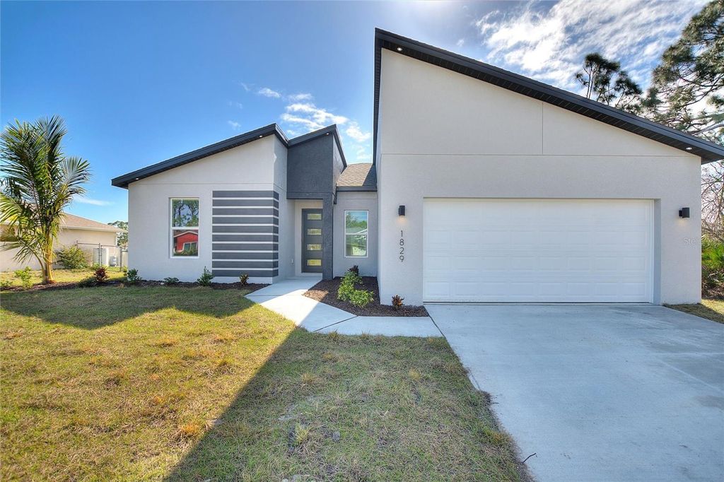 Photo of 1829 Northland Avenue, North Port, FL 34288 (MLS # O6398272)