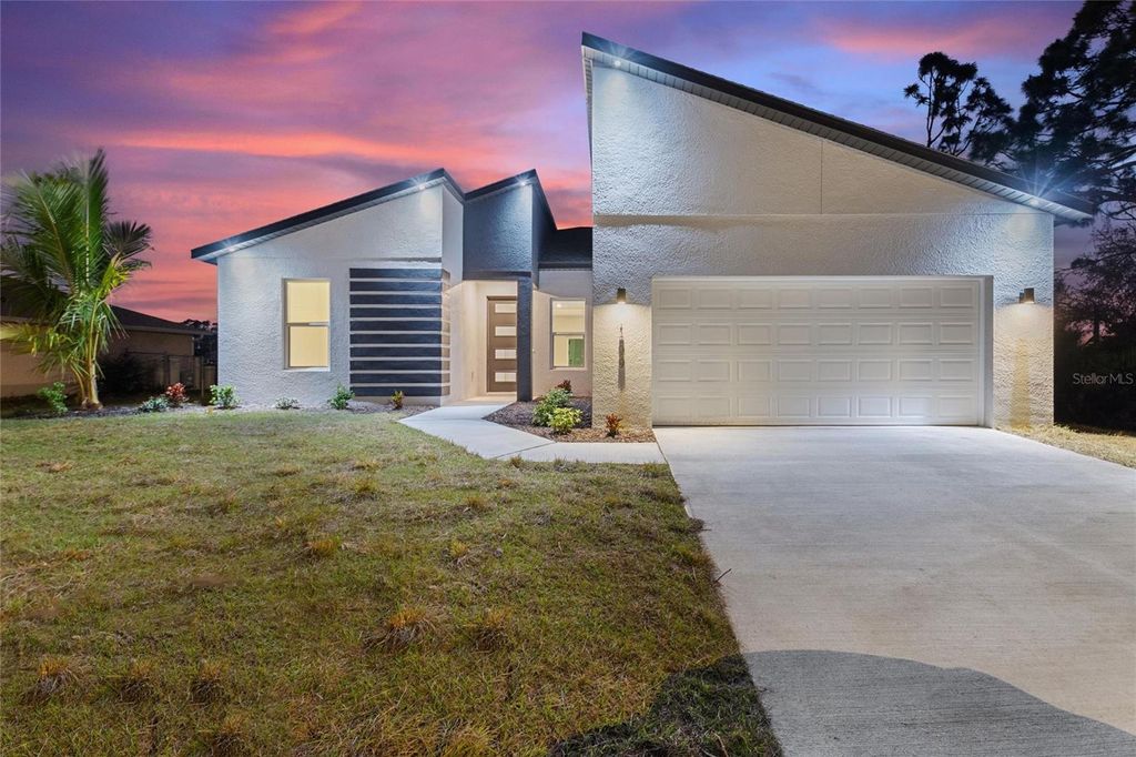 Photo of 1829 Northland Avenue, North Port, FL 34288 (MLS # O6398272)