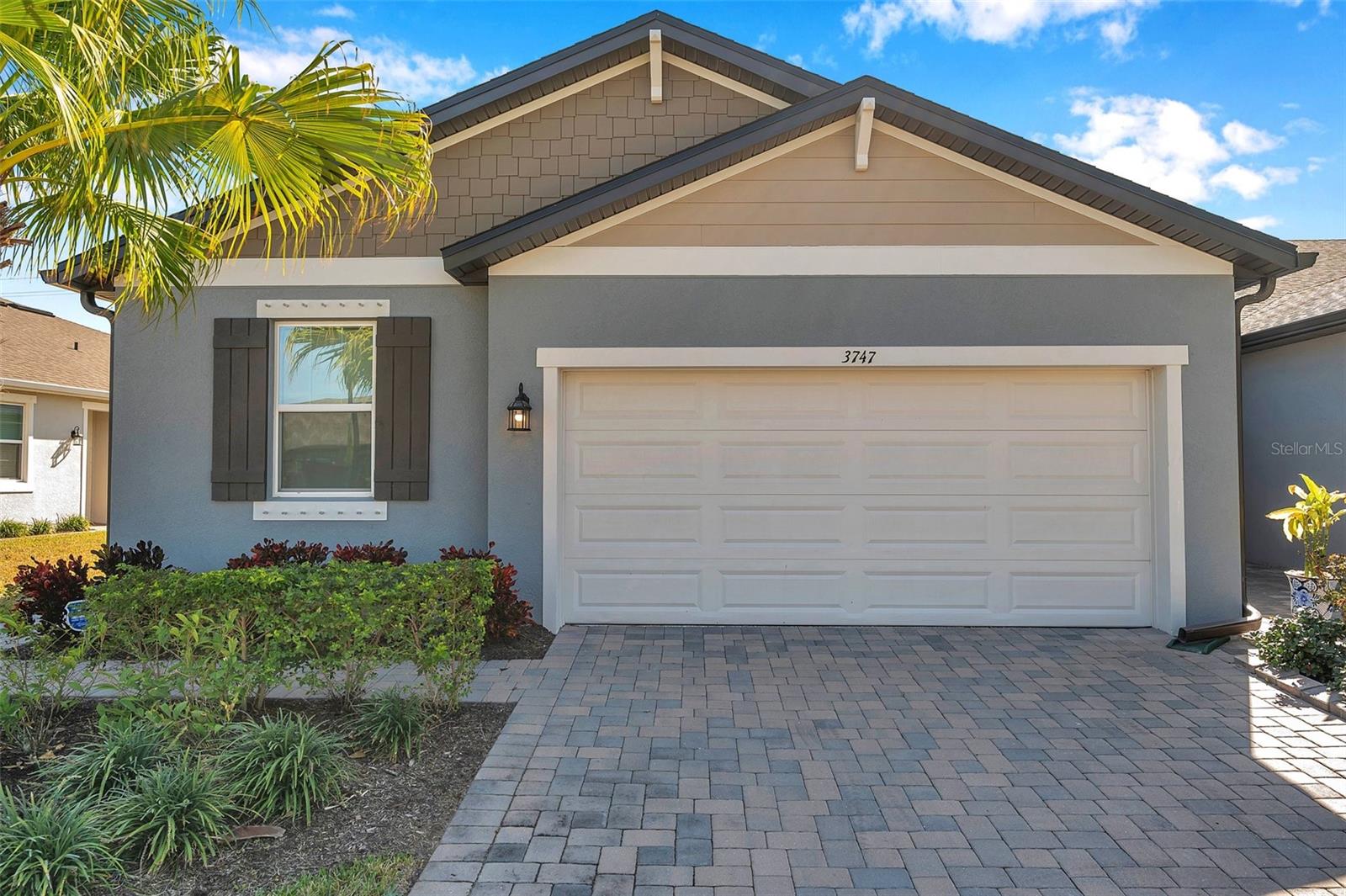 Don't miss your chance to own the stunning Topsail model home in The Preserve at La Paloma a 55+ community! Barely lived in 1,765 sq. ft. residence offers 3 bedrooms, 2 bathrooms, a den/office, and a 2-car garage. Enjoy the beautifully landscaped yard and paver driveway as you step inside to discover an open floor plan filled with natural light. The modern kitchen features elegant quartz countertops, stainless steel appliances, and a spacious island with a breakfast bar—perfect for culinary adventures! The generous great room and screened-in back porch create an ideal setting for entertaining guests. The primary suite is complete with double vanities, a private water closet, and a large walk-in closet with built-in shelving. The Preserve at La Paloma is a secure gated community with low HOA fees, no CDD fees and offers fantastic amenities like a pool, pickleball courts, and a fire pit area just across the street. Plus, you’ll enjoy the convenience of being centrally located near restaurants, shopping, hospitals, medical offices, beaches, and the interstate. Make this dream home yours today!