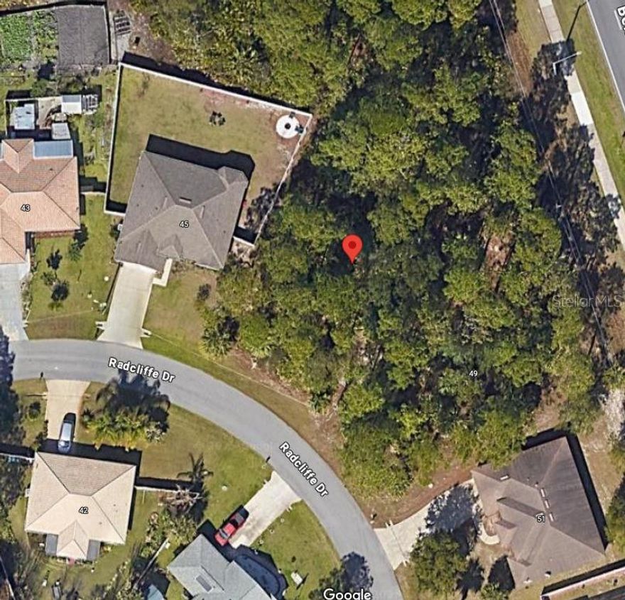 **Build-ready lot in a prime Palm Coast location!**  
Enjoy easy access to shopping, schools, a brand-new rec center, and everyday conveniences—plus the beach is just a quick drive away. No HOA and no build-time restrictions for total flexibility. Need more room? The neighboring lot is available too. Ideally situated between St. Augustine and Daytona Beach for effortless commuting and fun. X flood zone with water and sewer available. Come make your dream home happen!
