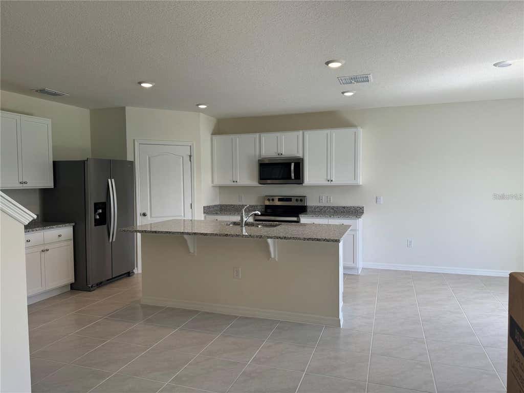Photo of 2572 Tulip Drive, Davenport, FL 33837 (MLS # S5151042)