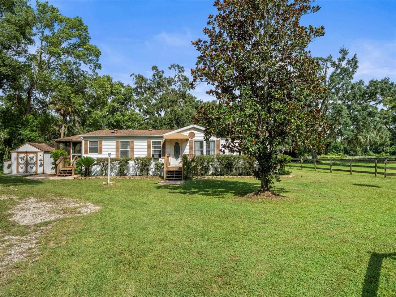 Cozy 3 Bedroom, 2 Bathroom Home on 1 Acre
The seller is offering a 5,000 allowance toward closing costs or home upgrades, giving you extra flexibility to make this home truly yours!
Welcome home! This charming 3-bedroom, 2-bath manufactured home sits on a beautiful acre of land, giving you the space and freedom to truly enjoy country living while still being close to everything.
Inside, the split-bedroom layout makes life easy, with the primary suite tucked away on one side for peace and privacy, and two additional bedrooms and a full bath on the other—just right for family, guests, or a home office. The open kitchen and family room combo is the heart of the home, creating the perfect spot to gather, cook, and relax together.
The roof is just 7 years old, giving you peace of mind and added value.
Step outside and you’ll find plenty of room to spread out. With a full acre, there’s space for a garden, backyard fun, or simply enjoying the quiet and open skies.
If you’ve been looking for a place that feels like home from the moment you walk in, this one is it. Don’t wait—come see it today!