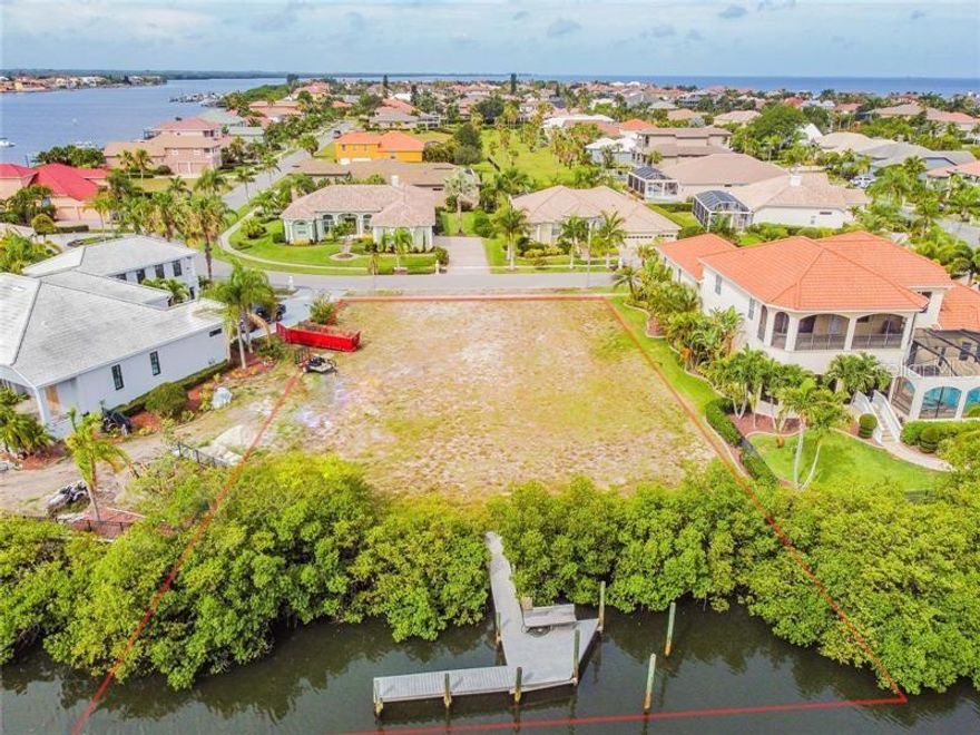 Rare opportunity to build your dream home on this oversized lot with over 100 feet of waterfront in the exclusive gated community of Andalucia. This property provides sailboat water with no fixed bridges to open bay and gulf waters - just 5 minutes away! The Andalucia community provides 24/7 security guard,a playground, clay tennis courts, and a clubhouse with pool right on Tampa Bay with views of St. Petersburg and Tampa. A fantastic location to entertain your family and guests. Apollo Beach is still a hidden gem and one of Florida's best kept secrets. It's located close to Tampa, St. Petersburg, Bradenton and Sarasota. With close proximity to three airports, Disney World, world renown beaches, many sporting and cultural events, Apollo Beach is an ideal location. Start planning your forever home now!