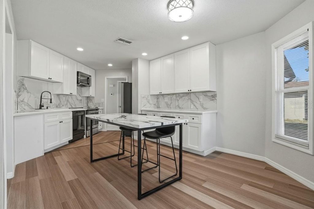 Photo of 12641 Shadow Ridge Boulevard, Hudson, FL 34669 (MLS # TB8462153)