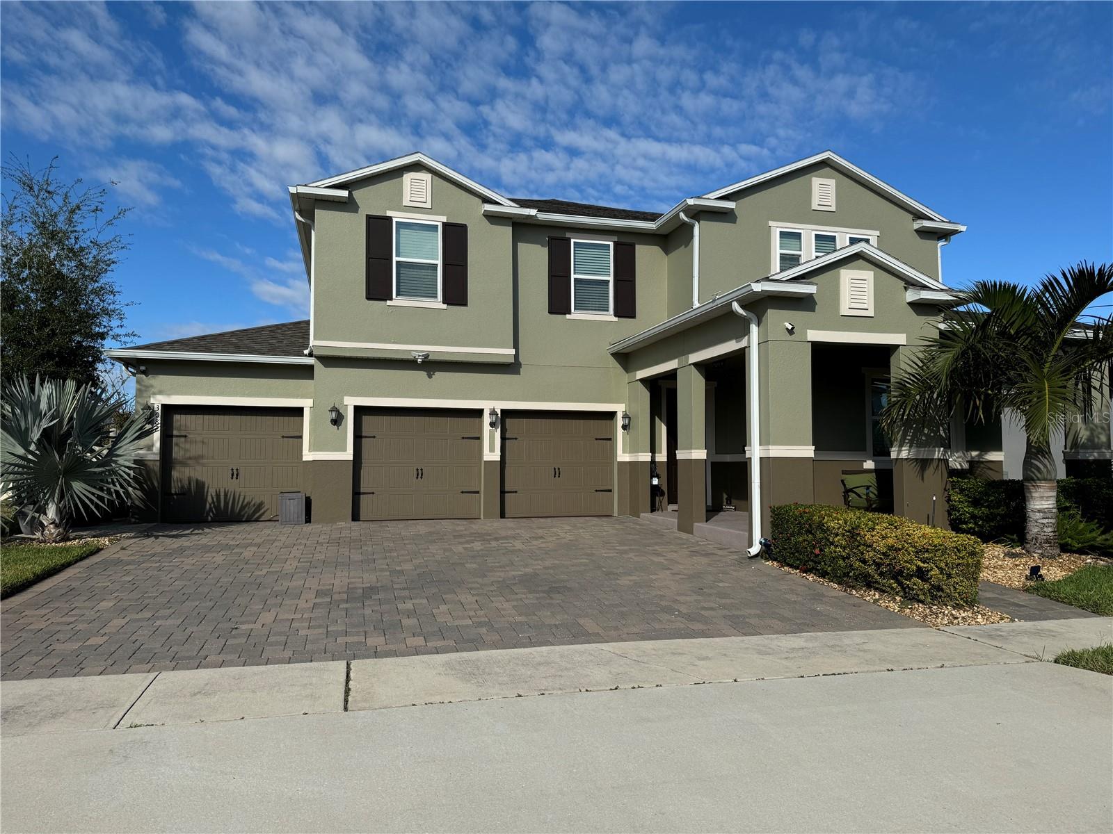 LOCATION! LOCATION! Located in the beautiful area of Winter Garden, the highly sought-after Orchard Park community! This ideal 5-bedroom 3 bath, saltwater pool home is for those who want to experience luxury living and beautiful scenery. Conveniently located near shopping areas, nature trails, homeowners will always have something to do in this thriving neighborhood. Enjoy community amenities such as the pool on a hot summer day or relax under the shaded cabana for some much-needed R&R. This well-maintained pool home is designed to maximize comfort and functionality. Its practical features, comfortable living spaces, and spacious bedrooms, including a downstairs guest suite, create a versatile floor plan that can accommodate the ever-changing needs of life. The chef's kitchen is equipped with ample cabinetry and countertop space, a pantry closet, and an island.  The open floor plan makes entertaining easy. Outside, the expansive, screen-covered lanai with retractable hurricane shutters and the sparkling pool create the perfect space for relaxation and entertaining guests.  Large windows let the NATURAL LIGHT pour in and sliding glass doors open to the COVERED LANAI, making it easy to enjoy poolside views year-round.  Closed office space is ideal for those who work from home!  The main floor bedroom and full bath is great for visiting guests or multi-generational living. Upstairs, you will find a generous LOFT/BONUS ROOM that provides additional flexible living space, along with three more bedrooms, a third full bath, and the spacious master suite that includes a large TWO WALK-IN CLOSETS and a private en-suite bath with DUAL/SPLIT VANITIES, a SOAKING TUB, and a separate shower.  For convenience, the laundry room is also on the second floor! The oversized 3-car garage has painted floors and with extra shelf storage above makes holiday decoration storage easy!  The house is freshly painted to last for years!  Schedule a showing now!