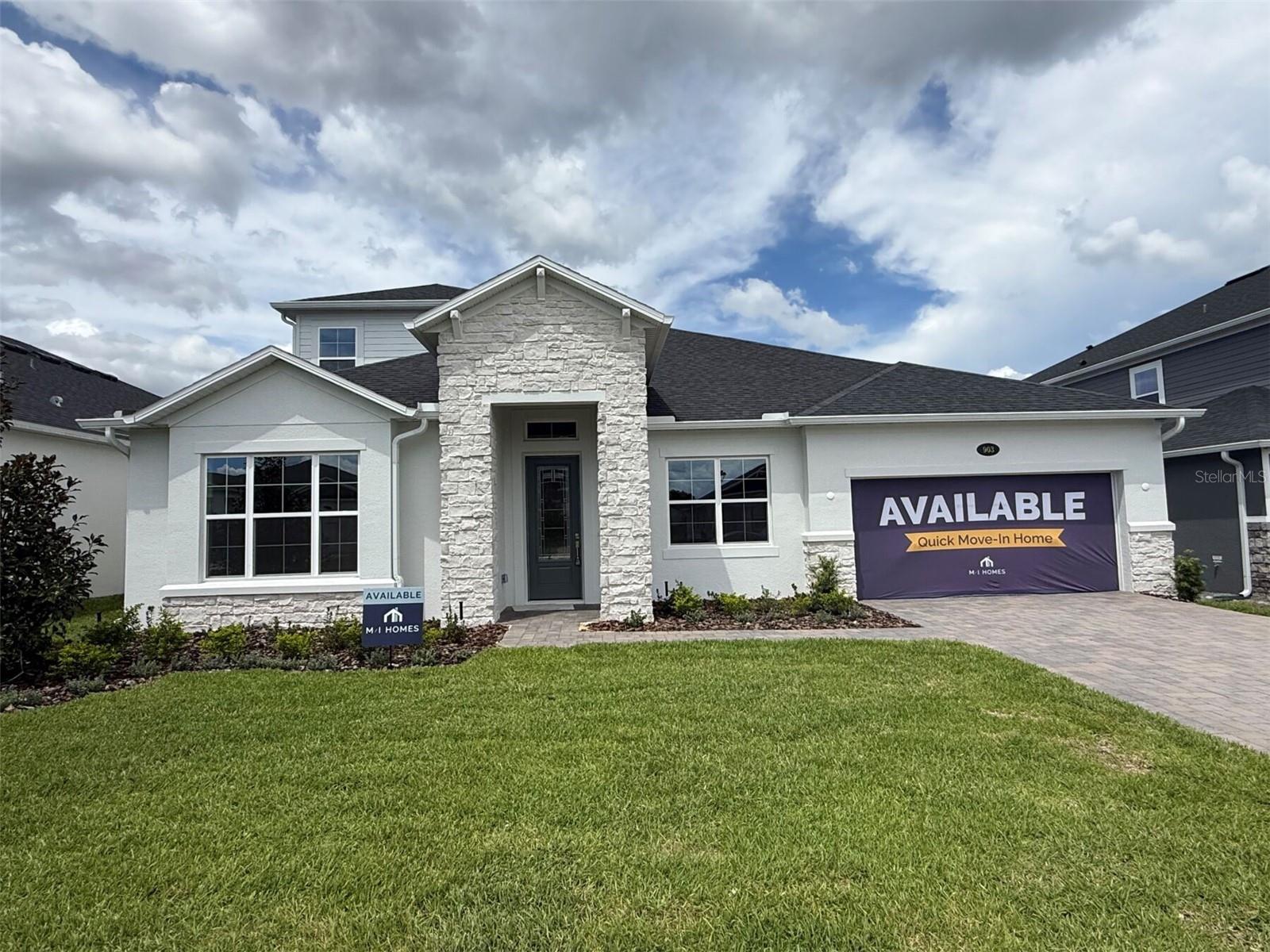 Ready now! Discover this exceptional new construction home at 903 Pointe Emerson Boulevard in Apopka, Florida. This home features 5 bedrooms–including a first-floor owner's bedroom–4.5 bathrooms open-concept living space, a dining room, a bonus room, a 2-car garage with storage extension, and much more! The floorplan maximizes functionality while maintaining an elegant flow between living areas. The open-concept design creates seamless transitions between the kitchen, dining, and living spaces, ideal for both relaxation and hosting gatherings. The owner's bedroom suite on the main level offers convenience and privacy, while the additional 4 bedrooms provide ample space for family, guests, or home offices. Each of the 4 bathrooms is carefully positioned for optimal accessibility and privacy. Located in a desirable Apopka neighborhood, this home offers proximity to parks and recreational opportunities. The area features quality design standards and well-planned community development, making it an attractive location for families seeking a blend of suburban tranquility and convenient access to amenities!