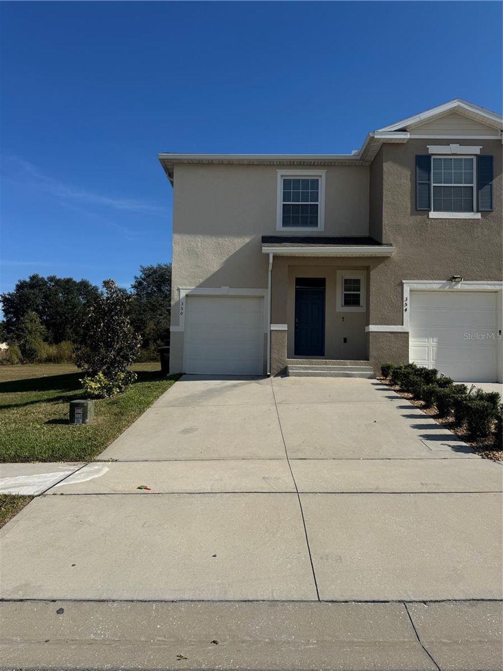 Photo of 350 Feltrim Reserve Blvd, Davenport, FL 33837 (MLS # S5139772)