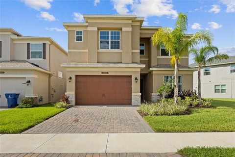 Photo of 32684 Tamarind Grove Lane, Wesley Chapel, FL 33543 (MLS # TB8516509)