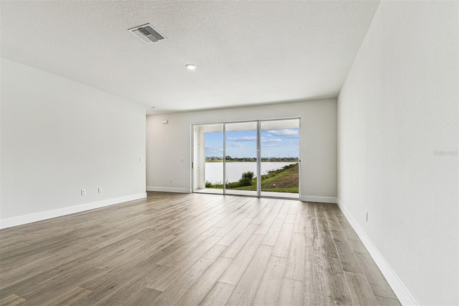 PENINSULA AT RHODINE LAKE - Residential