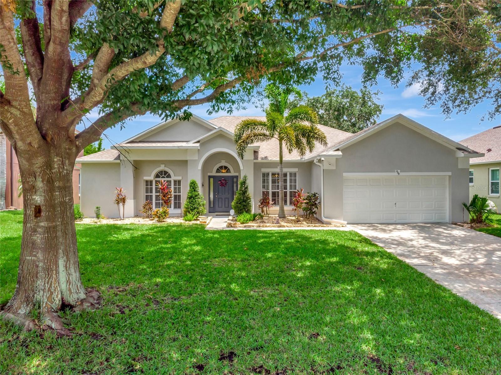 Luxury, Convenience, and Comfort in John’s Landing! This thoughtfully updated and move-in ready 4-bedroom, 2-bath home offers flexible living in one of Oakland/Winter Garden’s most desirable gated communities, the gorgeous John’s Landing. You will feel welcomed home with mature landscaping, an extended driveway, a covered entry, Ring doorbell, and exterior lighting—perfect for a warm arrival day or night.
Natural light fills the home, showcasing fresh neutral paint, new 9” LVP flooring (2024) and 5” baseboards throughout. A spacious front living room off the foyer provides a warm greeting, while a formal dining room easily flexes as a home office or den to fit your lifestyle. The heart of the home is the huge updated kitchen featuring granite counters, a stylish backsplash, ample storage, under-cabinet microwave, beverage station/wine rack, and a large pantry. There’s plenty of prep space with a breakfast bar and an additional eat-in nook overlooking the outdoor patio and family room—perfect for gatherings.
The primary suite offers a serene retreat with sliding glass doors to the screened-in patio, dual large walk-in closets, and a spacious en suite spa-like bath with soaking tub, walk-in shower, and private water closet, and a private door to the second bedroom for optional nursery or office use. The split floor plan offers two additional spacious bedrooms and a second updated full bathroom for added privacy with lots of extra storage and closet space.
Step outside to your backyard oasis, featuring a large screened-in patio that flows to an expansive paved area (sealed & painted 2025) with an amazing in-ground spa with updated pump (2025), separate covered grill area, and a tiered patio with a fire pit area—ideal for Florida evenings under the stars, perfect for cozy gatherings and sunset chats. A graceful row of bamboo along the back creates a soft natural screen, adding a layer of privacy while allowing you to enjoy the breeze and creates a low-maintenance back yard so you can spend your time enjoying the Florida Sunshine!
For added flexibility and future growth, the extended 2-car garage offers ample shelving, a two-bike pulley system, and space for workshop or additional storage for kayaks, SUPs or boating equipment, making it easy to keep everything organized while fitting your lifestyle.
The community offers a private boat ramp for easy access to John’s Lake for boating, fishing, jet skiing, and amenities include pickleball, tennis, basketball, and a playground. The location is unbeatable, with top-rated schools, easy access to the West Orange Trail, and minutes from historic Downtown Winter Garden, Plant Street Market, lots of shopping, parks, dining, and the renowned farmers market.
Enjoy an easy commute to Disney, Universal, downtown Orlando, and the airport, with a new hospital and much more coming nearby! Don’t miss the chance to live in the heart of one of Central Florida’s fastest-growing and most loved communities in this beautiful move-in-ready home with room to live, work, and play! Schedule your showing today and discovery your next chapter in John’s Landing!
Roof 2019, HVAC 2019, Some windows replaced 2022.