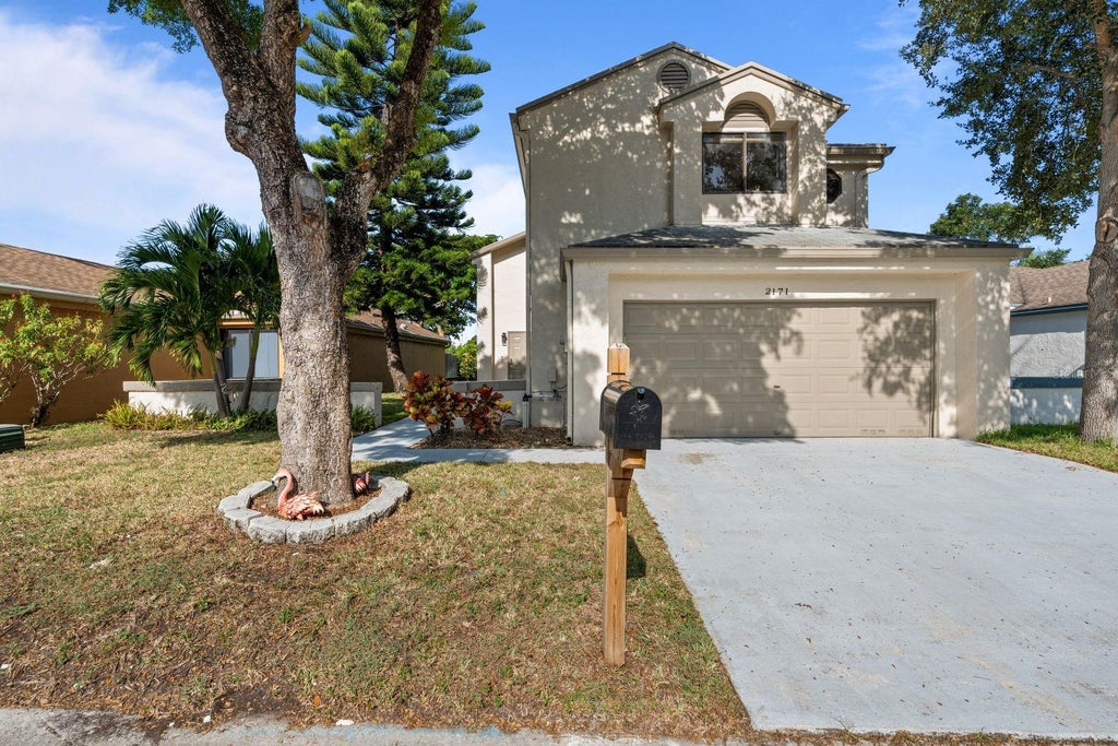 Photo of 2171 NW 34th Terrace, Coconut Creek, FL 33066 (MLS # FC321064)